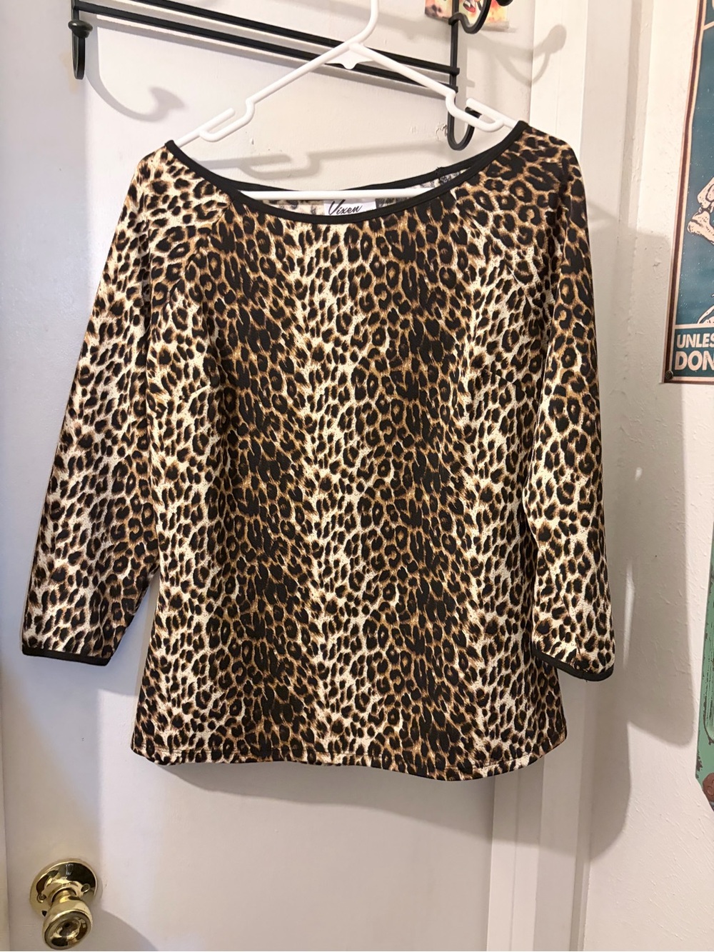 Vixen- size XL- leopard print 3/4 sleeve top w/ bk trim at cuffs, neck. VGC.